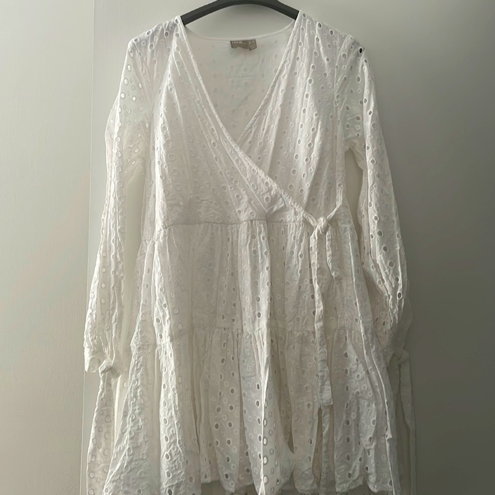 ASOS white wrap dress with designs all over the dress